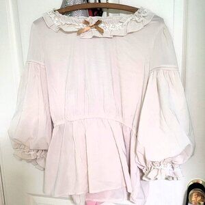 Cream baby doll top with puffed sleeves